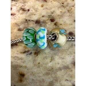 3 Authentic glass trollbeads